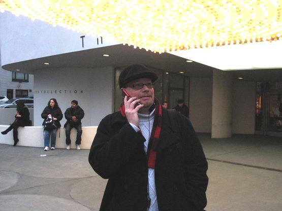 Me outside the Guggenheim Museum on cellphone with Juan